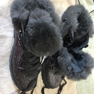 Pair of Jessica Simpson faux fur boots.